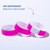 Bilden visar tre rosa Tyvek-armband med text som anger att det finns 500 enheter gjorda av robust Tyvek.